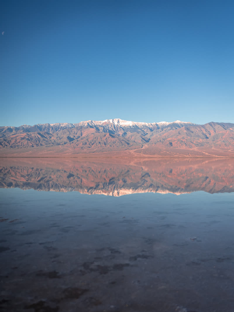 Alone on the flooded pan under a clear sky