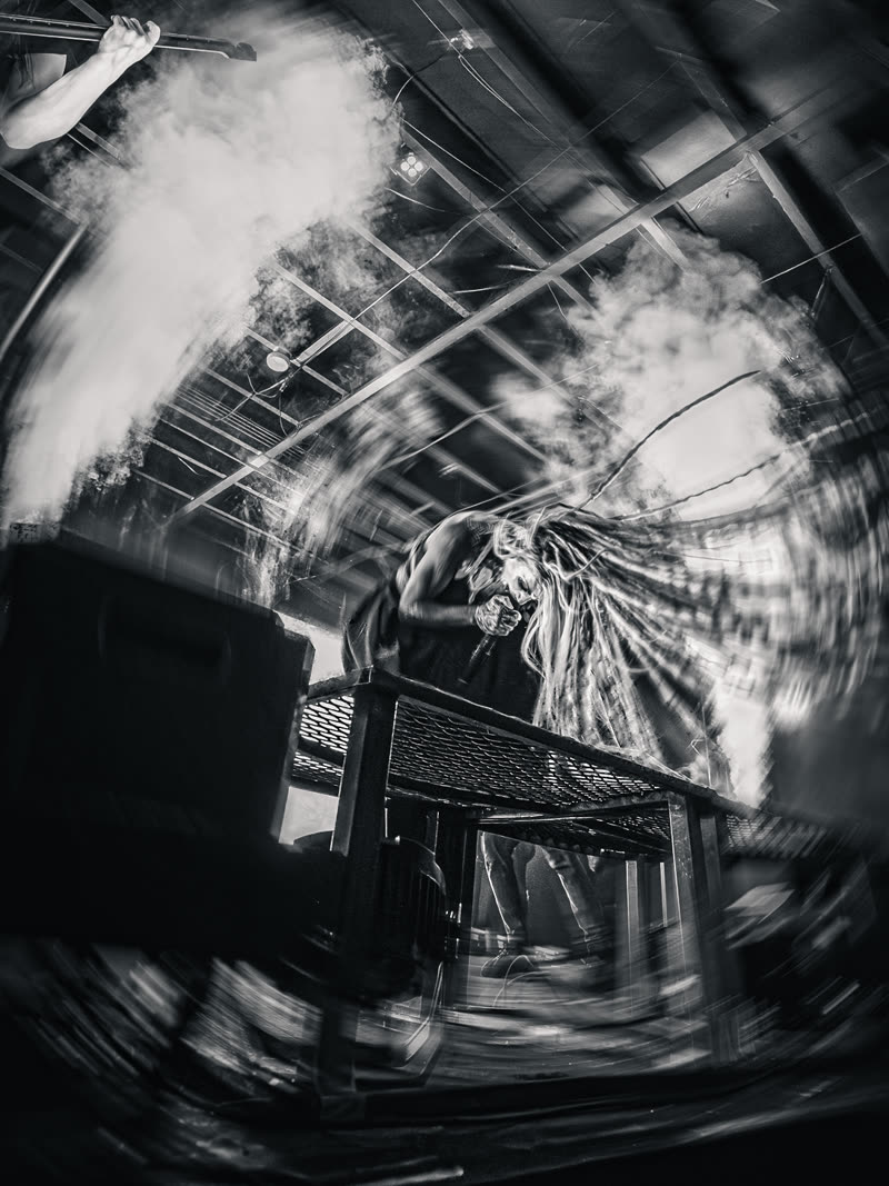 Infected Rain on stage through smoke