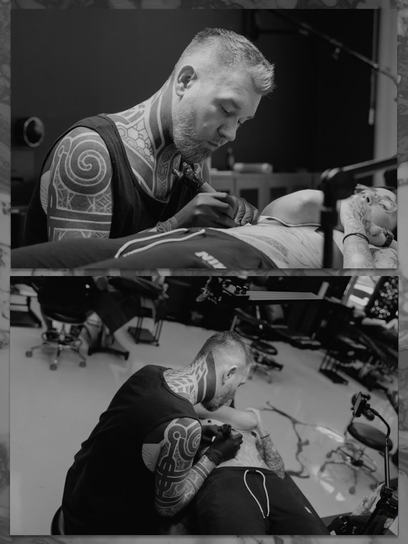 Maxim.xiii tattooing a leg at the Las Vegas studio, black and white