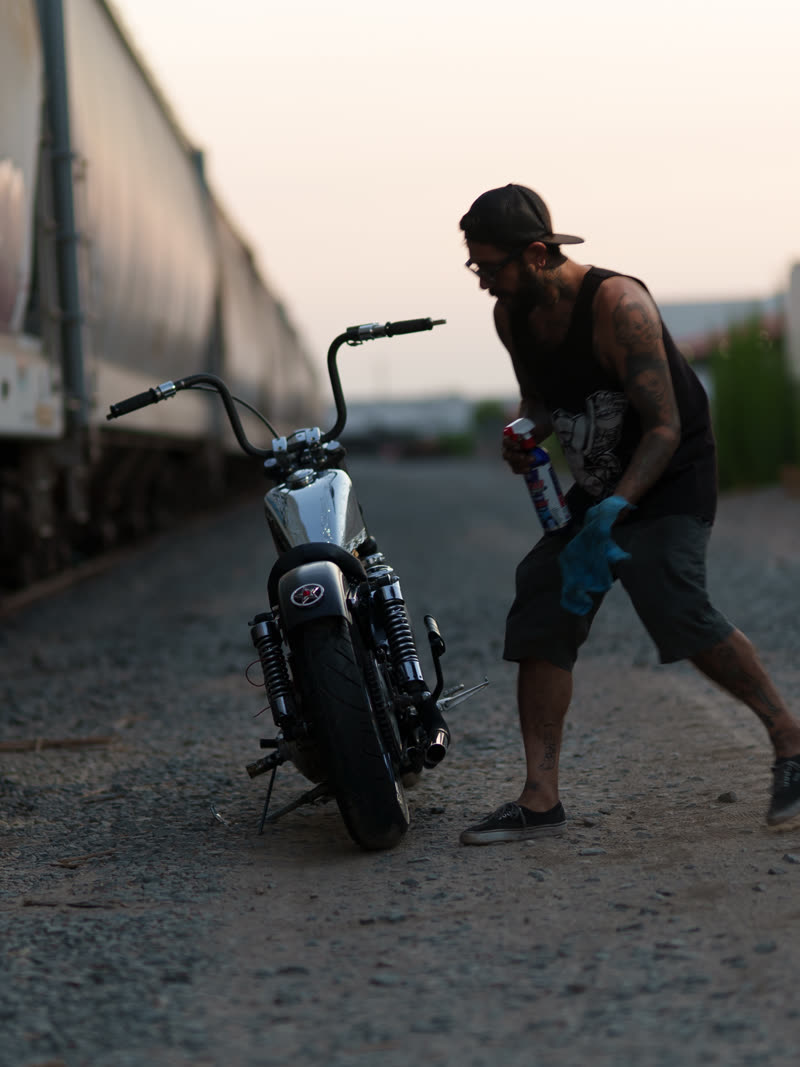 Walking back to the chopper between two lines of freight cars