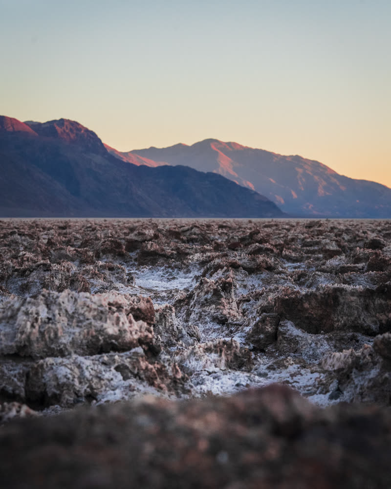 Salt formations broken against a sunset sky