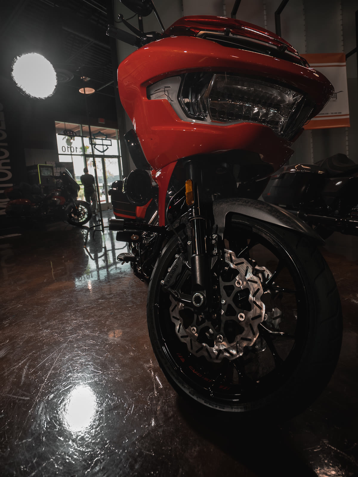 The orange CVO Road Glide ST from low at the front