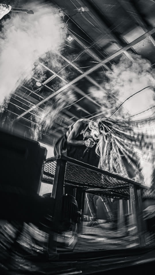 Infected Rain on stage through smoke