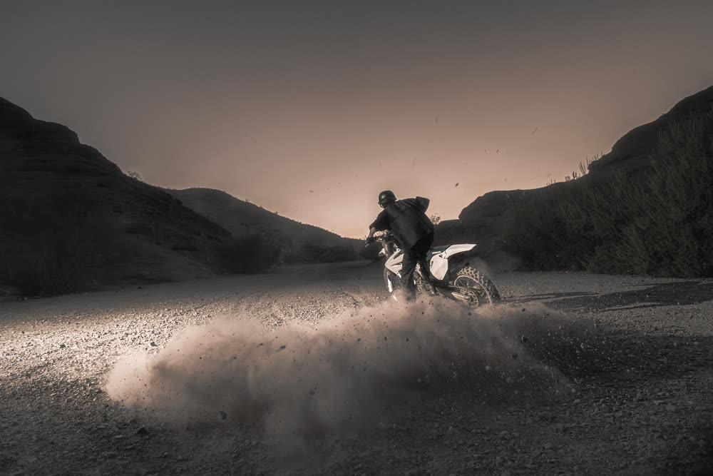 Cutting a turn, dust breaking to the right