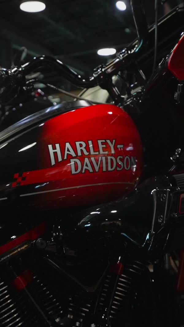 Rider on a 2026 CVO Street Glide, headlight lit